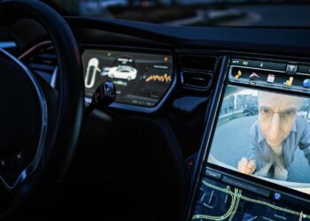 Tesla spying users