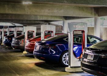 Tesla cars charging supercharger station