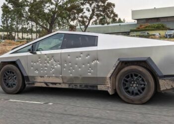 Tesla Cybertruck bulletproof bullet holes Tommy gun
