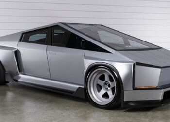 Lowered Tesla cybertruck with widebody kit front three quarters